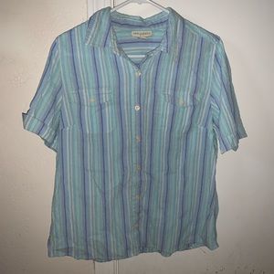 Multicolored blue button up shirt.